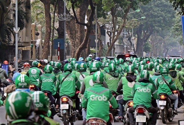grab-boc-hoi-gan-11-von-hoa-trong-mot-tuan-tranh-cai-thu-nhap-tai-xe-viet-nam-tro-thanh-tam-diem-1789288336.jpg